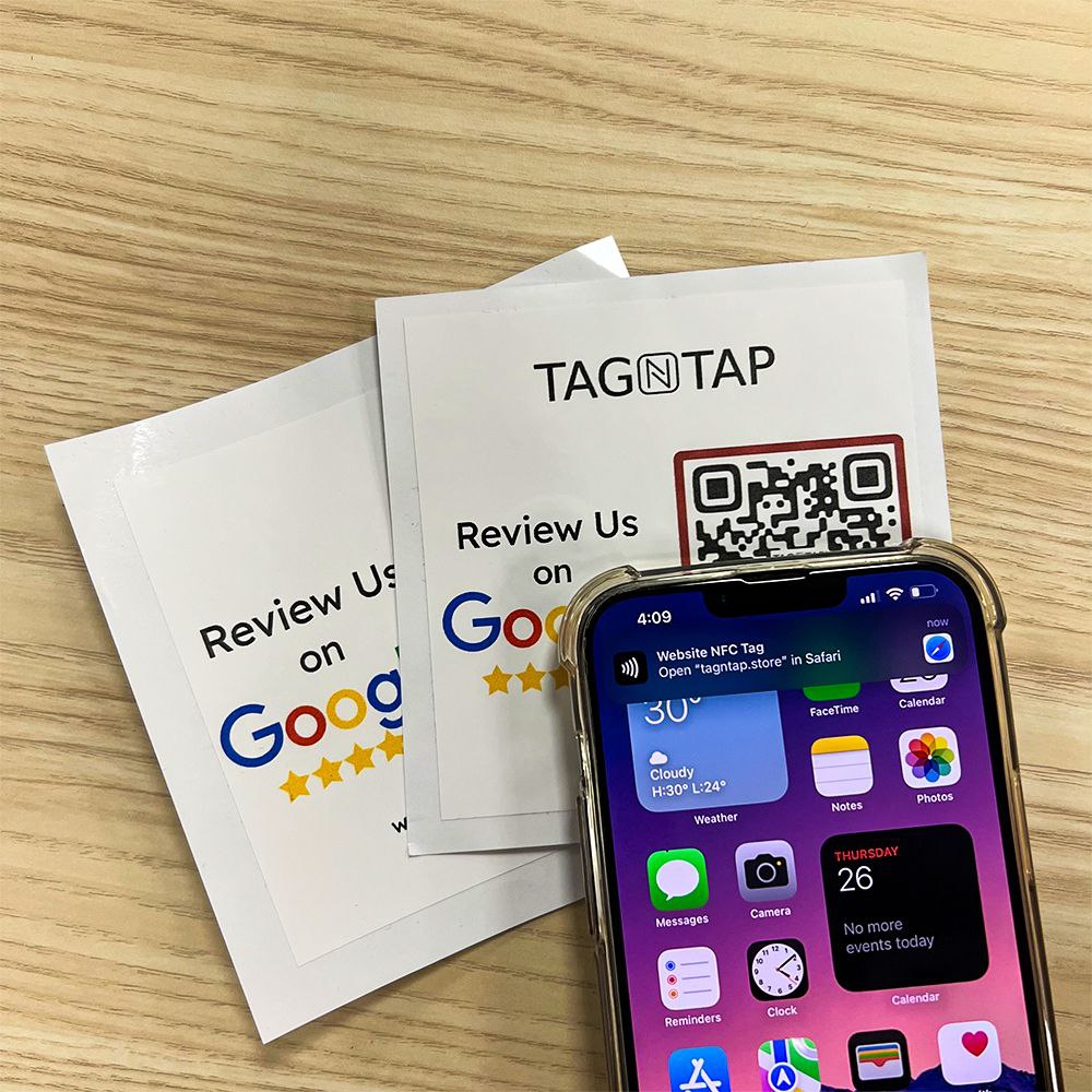 TagNTap in action showing NFC stickers for Google reviews with a smartphone